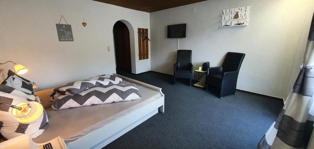 Postel nebo postele na pokoji v ubytování Mountain Motel
