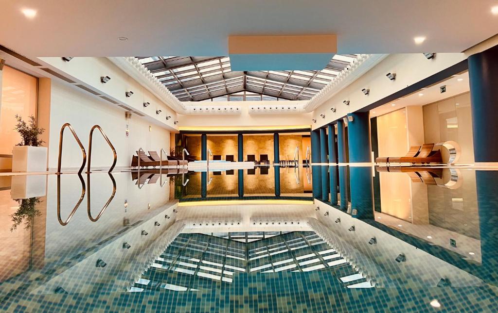 Bazén v ubytování Hotel Mepas nebo v jeho okolí
