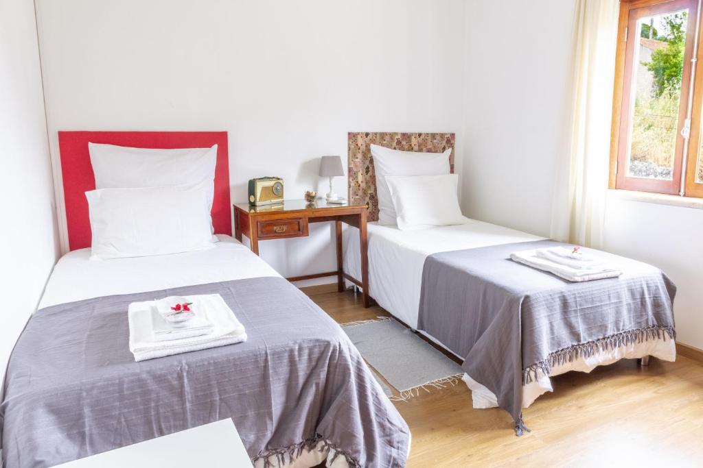 Postel nebo postele na pokoji v ubytování Meio Country House
