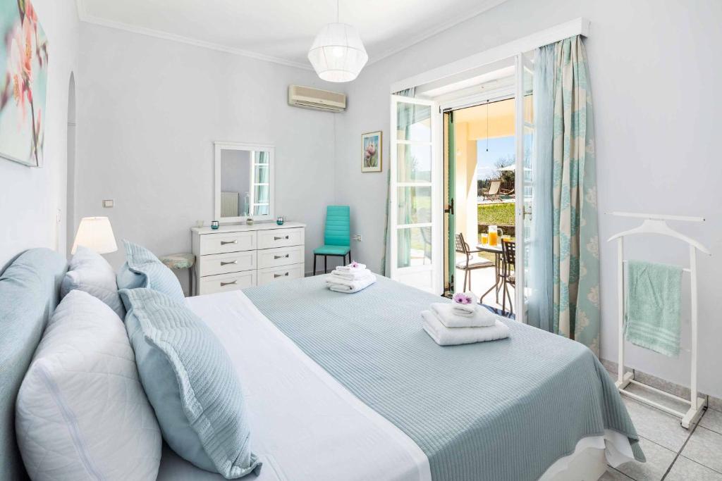 Posteľ alebo postele v izbe v ubytovaní Villa Secret Paradise
