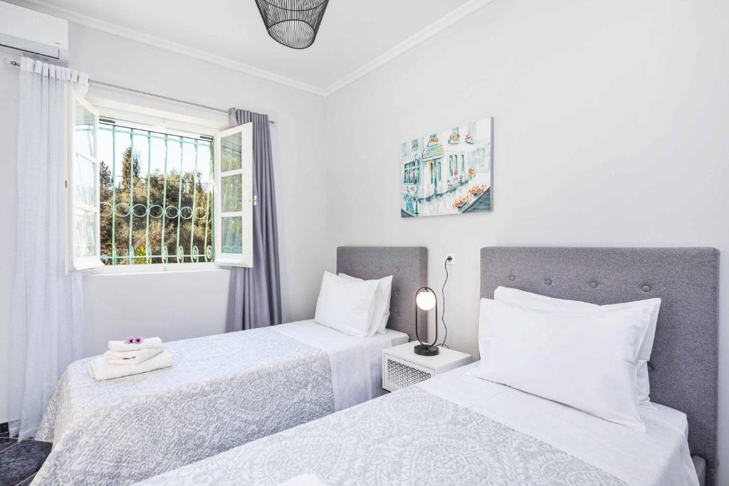 Posteľ alebo postele v izbe v ubytovaní Villa Secret Paradise
