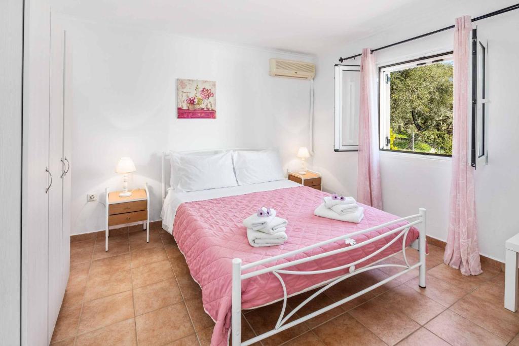 Posteľ alebo postele v izbe v ubytovaní Villa Secret Paradise