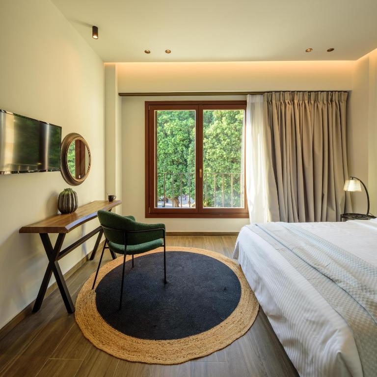Postel nebo postele na pokoji v ubytování Arthur Suites in Old Town