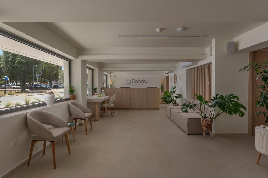 Posezení v ubytování Sandy Seaside Suites