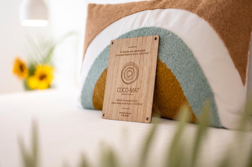 Postel nebo postele na pokoji v ubytování Sandy Seaside Suites