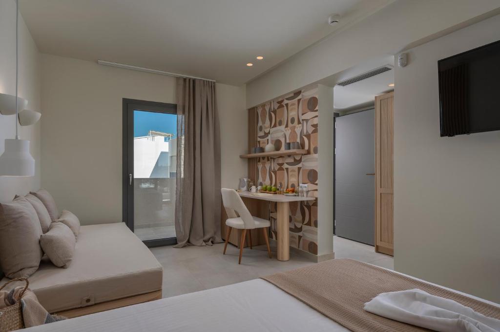 Postel nebo postele na pokoji v ubytování Sandy Seaside Suites