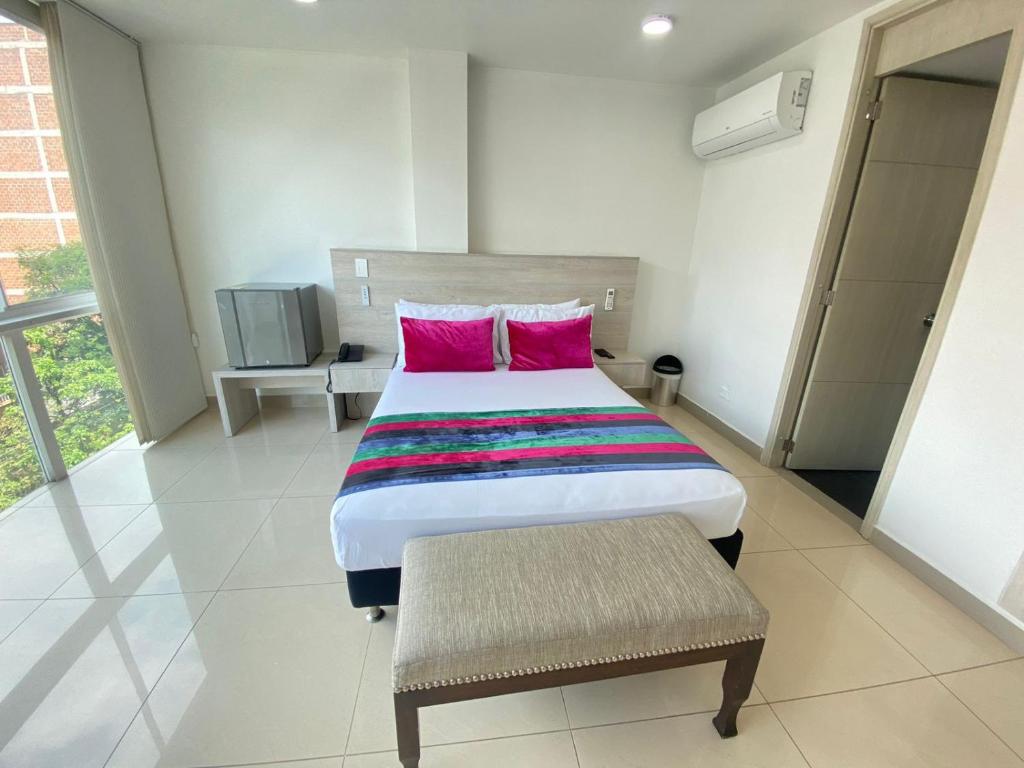 Postel nebo postele na pokoji v ubytování Hotel Suite Comfort