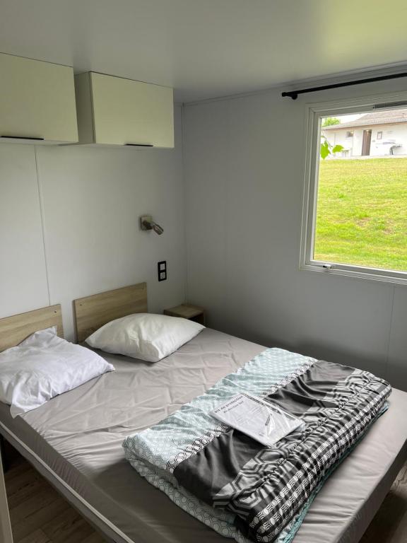 Postel nebo postele na pokoji v ubytování Camping Pen Guen