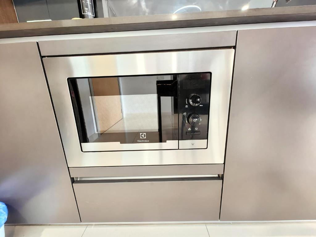 Kuchyň nebo kuchyňský kout v ubytování B2107 Grand Medini Pool View 100ms Netflix By STAY