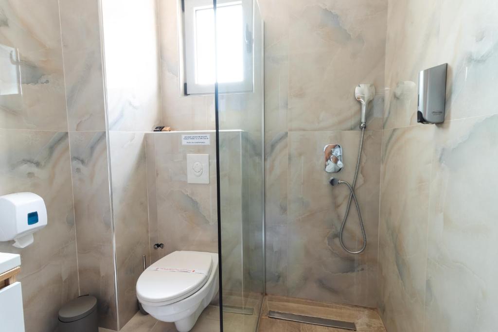 Kylpyhuone majoituspaikassa Lux Hotel M