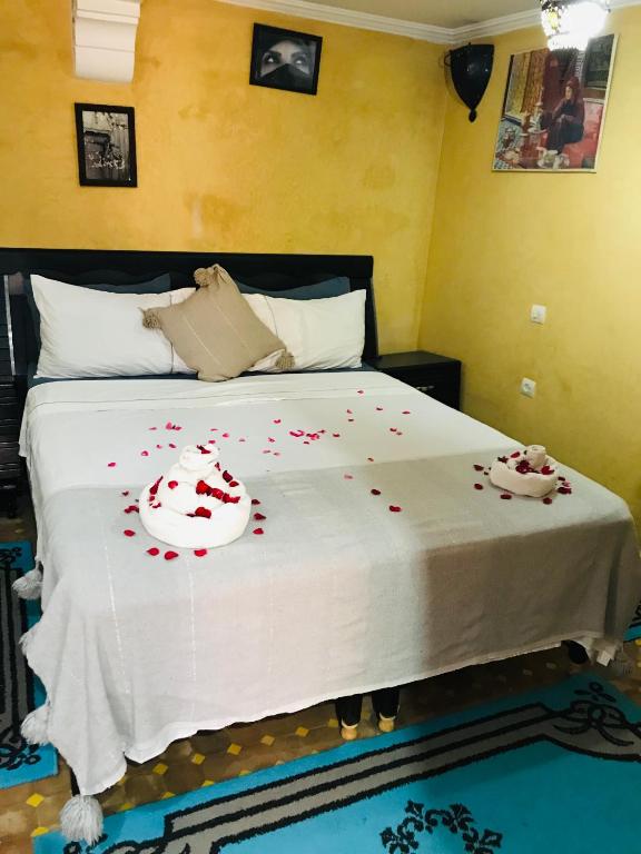 Postel nebo postele na pokoji v ubytování Riad Layla Rouge