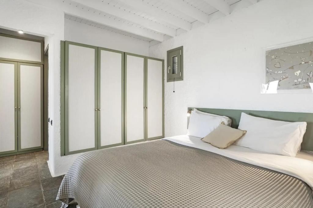 Postel nebo postele na pokoji v ubytování Niriides Resort