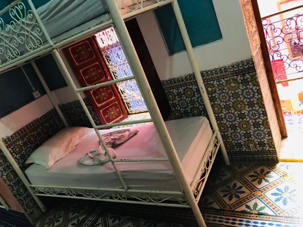 Postel nebo postele na pokoji v ubytování Riad Layla Rouge