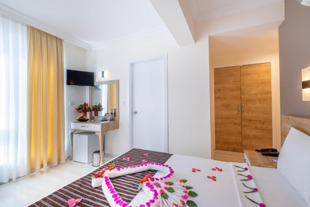 TV a/nebo společenská místnost v ubytování Viking Beach Hotel & Spa