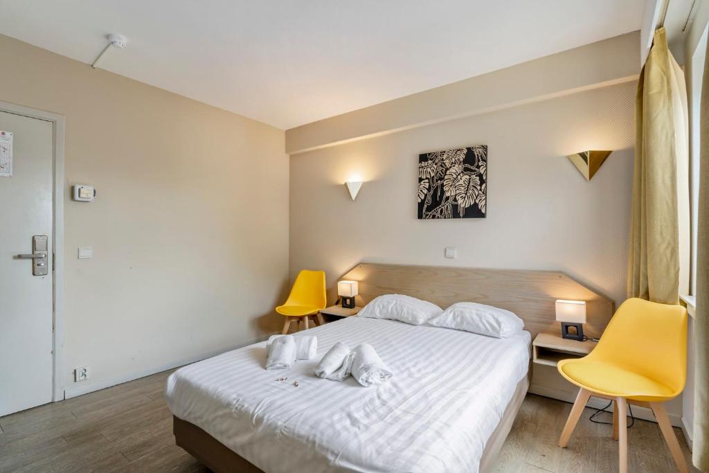 Postel nebo postele na pokoji v ubytování Sleep & Go Brussels South
