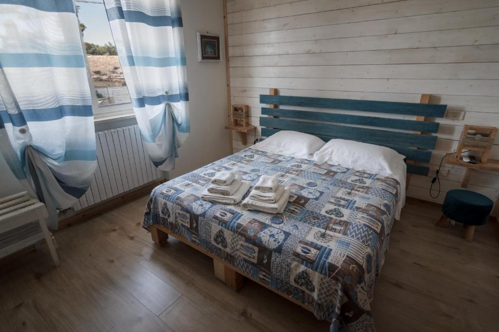 Кровать или кровати в номере Villa Lina Bed&Breakfast