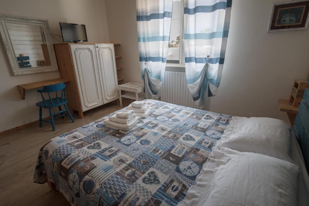 Кровать или кровати в номере Villa Lina Bed&Breakfast