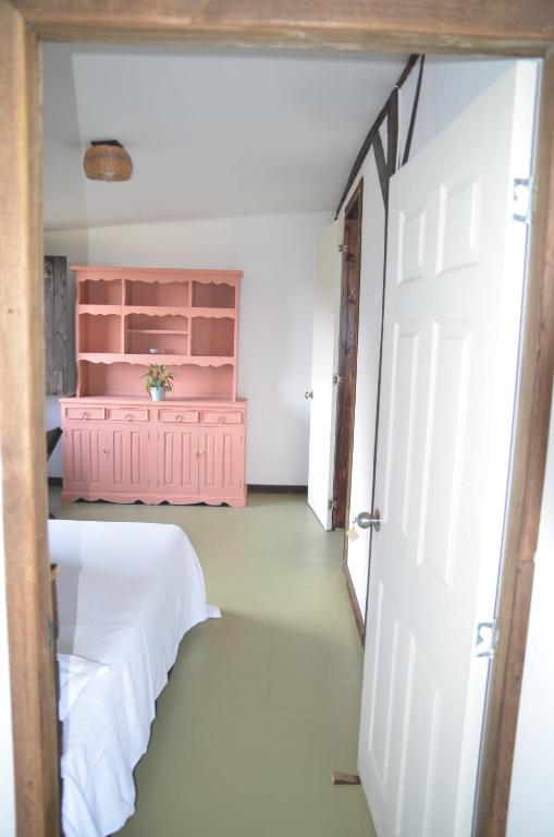 Postel nebo postele na pokoji v ubytování Hostal Restaurante Checha