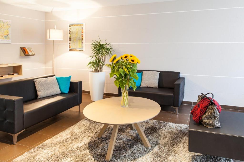 Posezení v ubytování Aparthotel Adagio Access Saint Louis Bâle