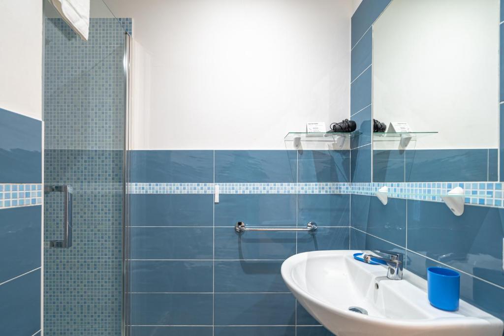 Koupelna v ubytování Cavour Rooms