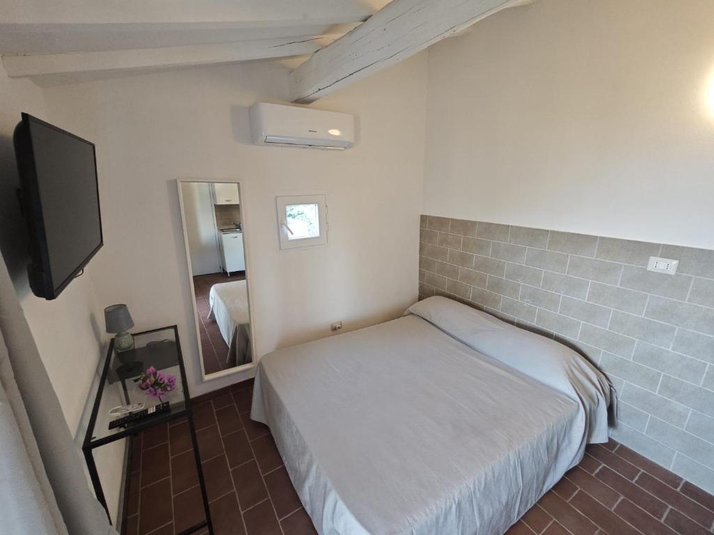 TV a/nebo společenská místnost v ubytování Hotel Golfo Azzurro