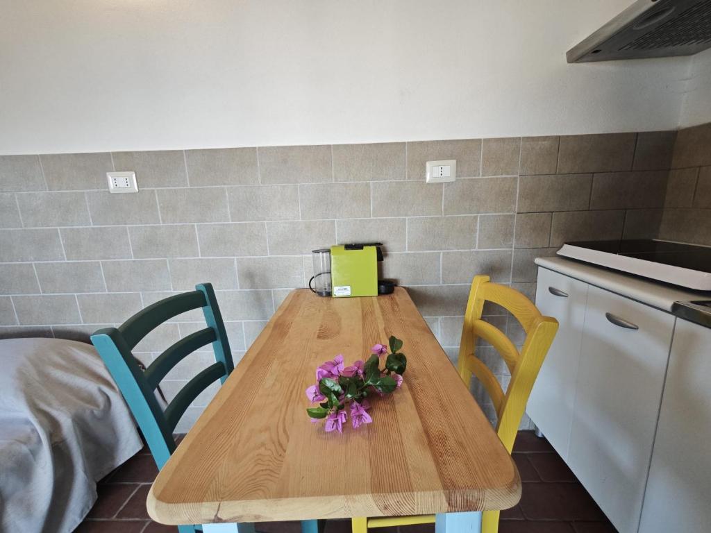 Kuchyň nebo kuchyňský kout v ubytování Hotel Golfo Azzurro