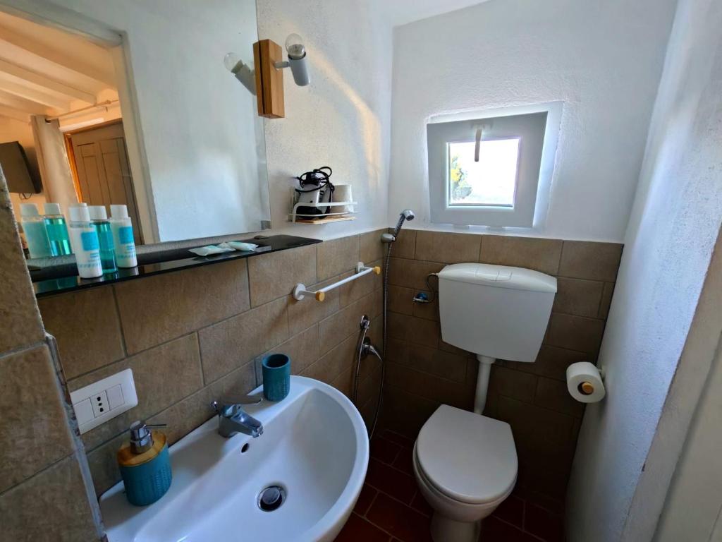 Koupelna v ubytování Hotel Golfo Azzurro