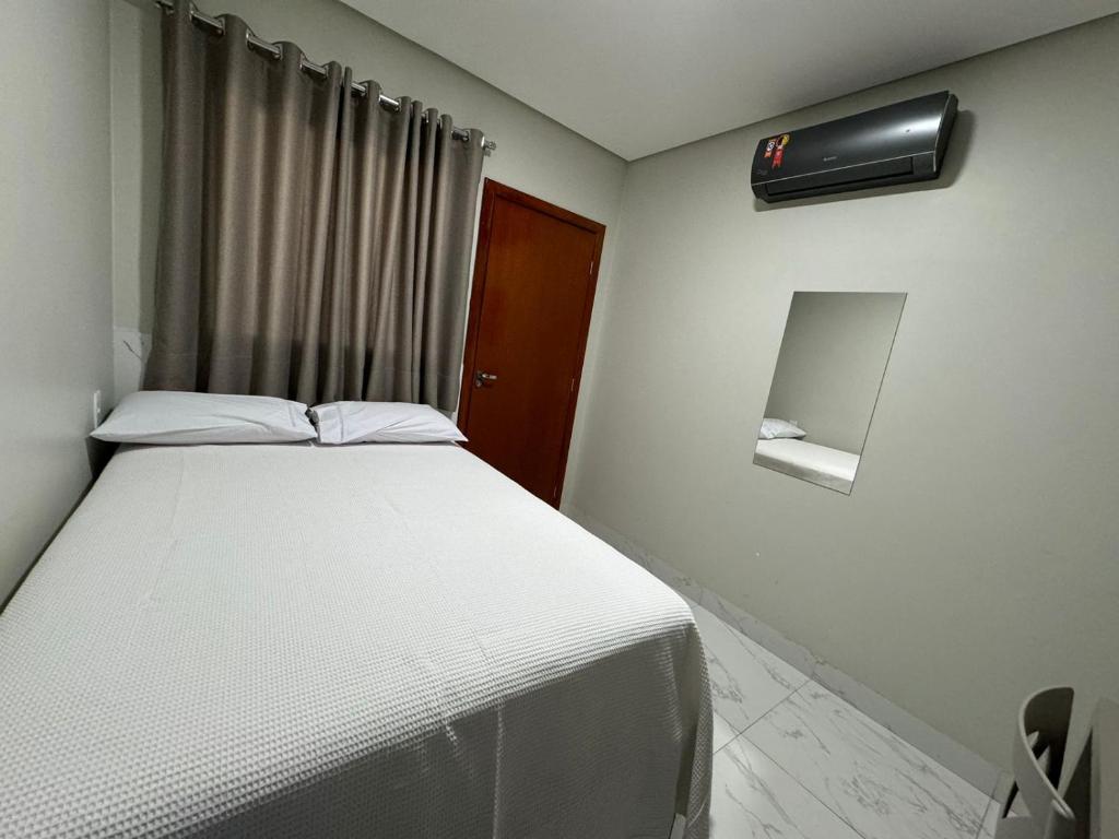 Postel nebo postele na pokoji v ubytování Hotel Radan