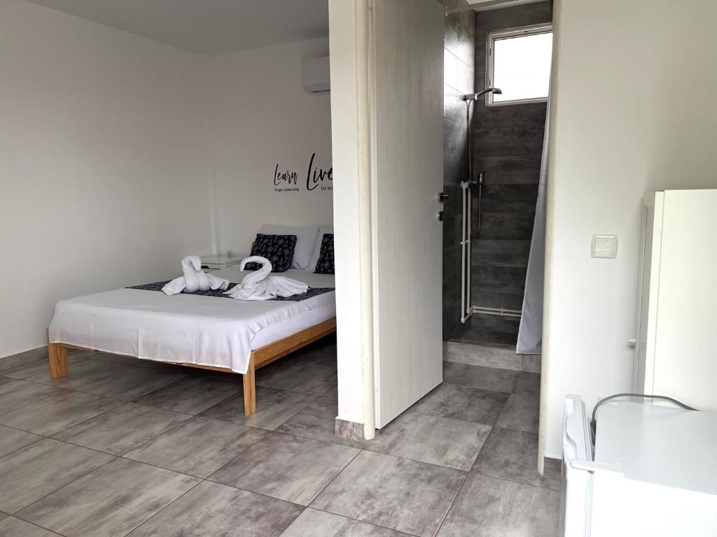 Postel nebo postele na pokoji v ubytování Vila Matt
