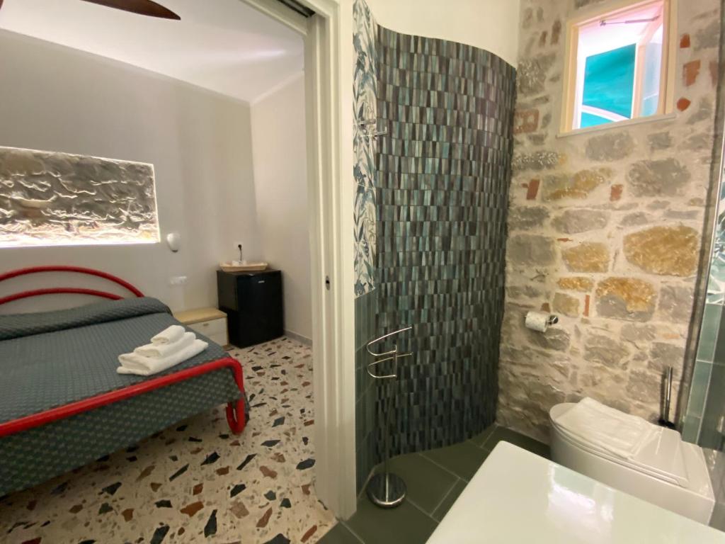 Koupelna v ubytování Cinquestelle Albergo del centro storico
