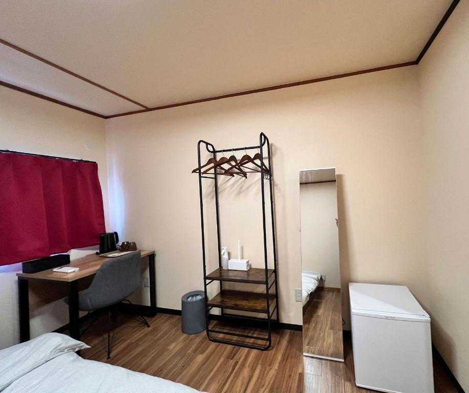 Postel nebo postele na pokoji v ubytování Jinya Sunset Inn by Murasaki