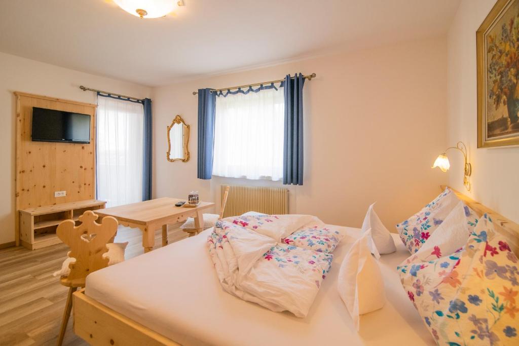 Postel nebo postele na pokoji v ubytování Garni Stübele