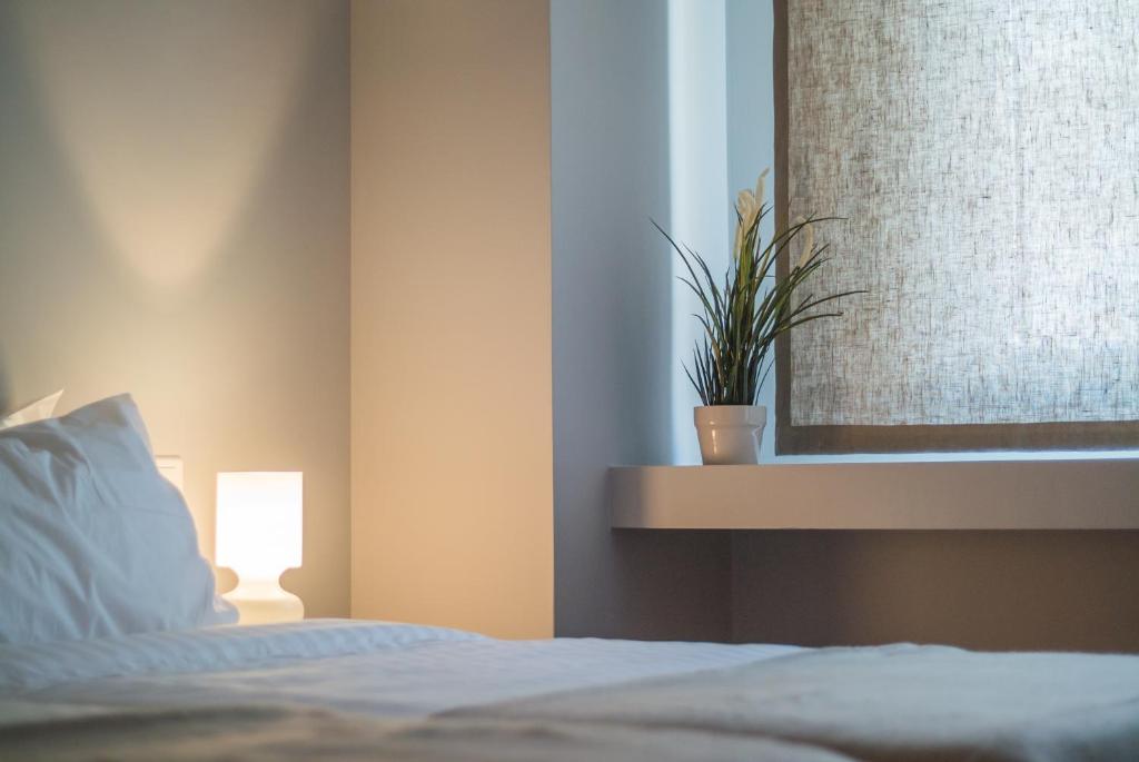 Posteľ alebo postele v izbe v ubytovaní ABA Apartment Korizi street