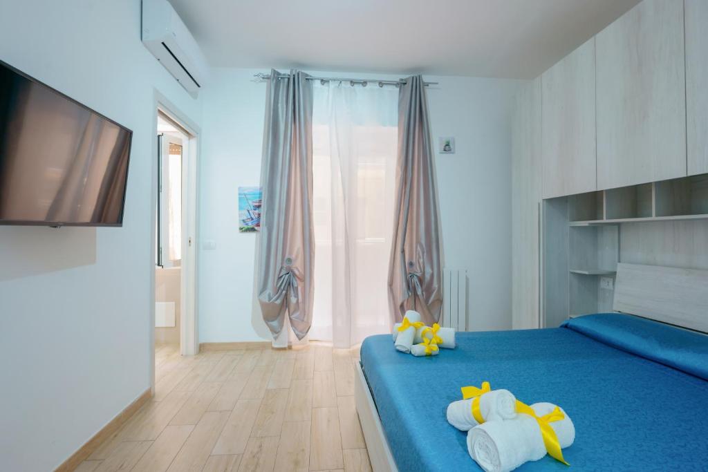 Posteľ alebo postele v izbe v ubytovaní eliterooms