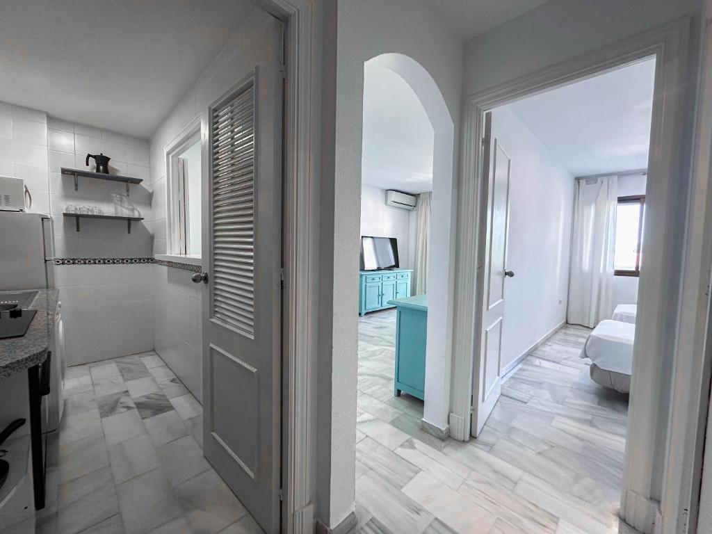 Łóżko lub łóżka w pokoju w obiekcie 3-401-Apartamento 1 dormitorio