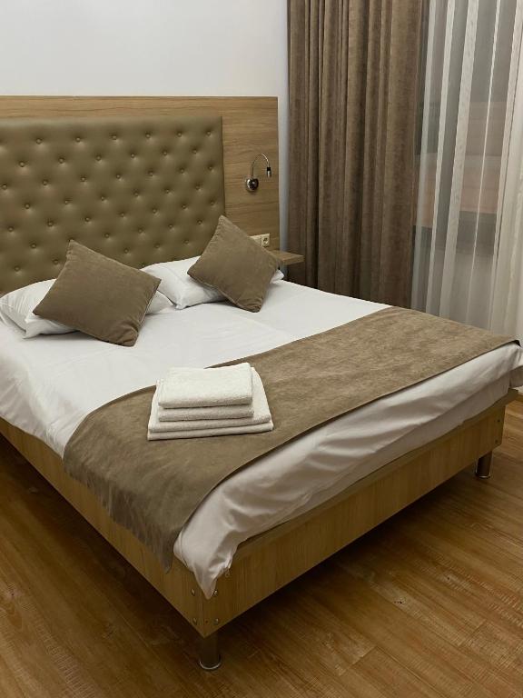 Postel nebo postele na pokoji v ubytování Hotel Varios