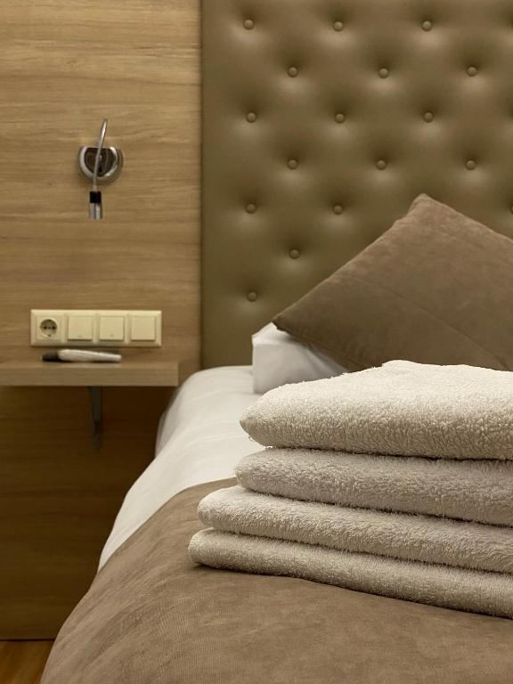 Postel nebo postele na pokoji v ubytování Hotel Varios