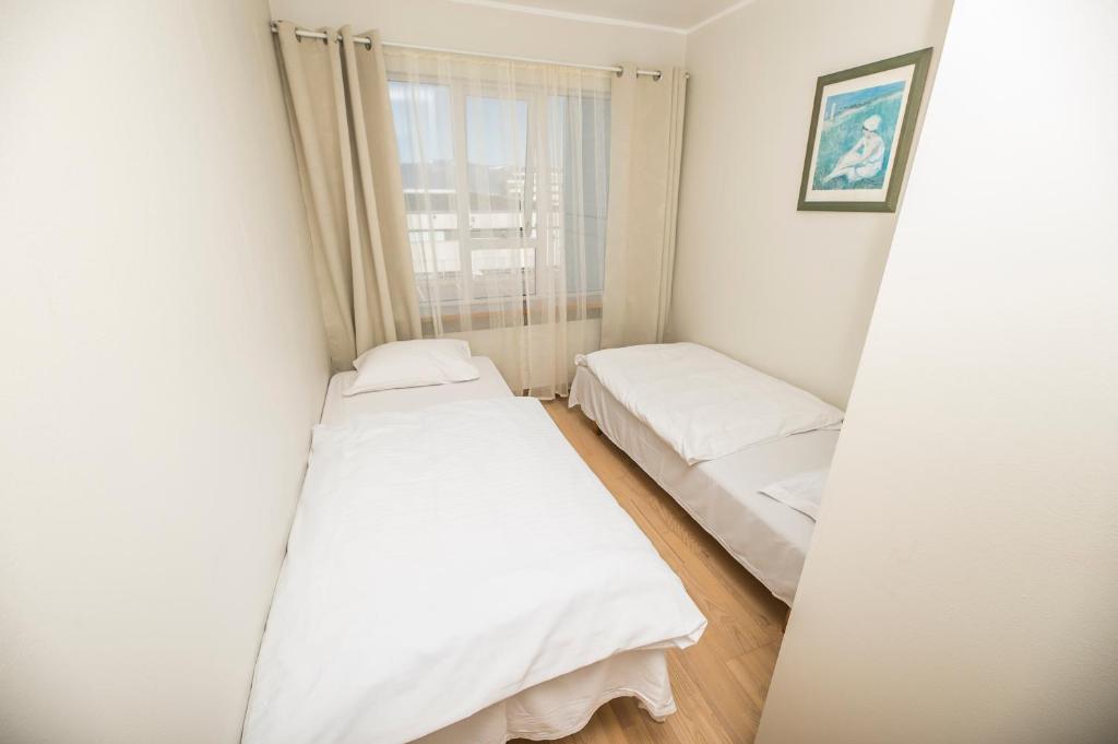 Postel nebo postele na pokoji v ubytování Hotel Orkin