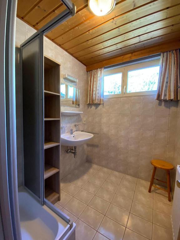 Koupelna v ubytování Obenfigerhof