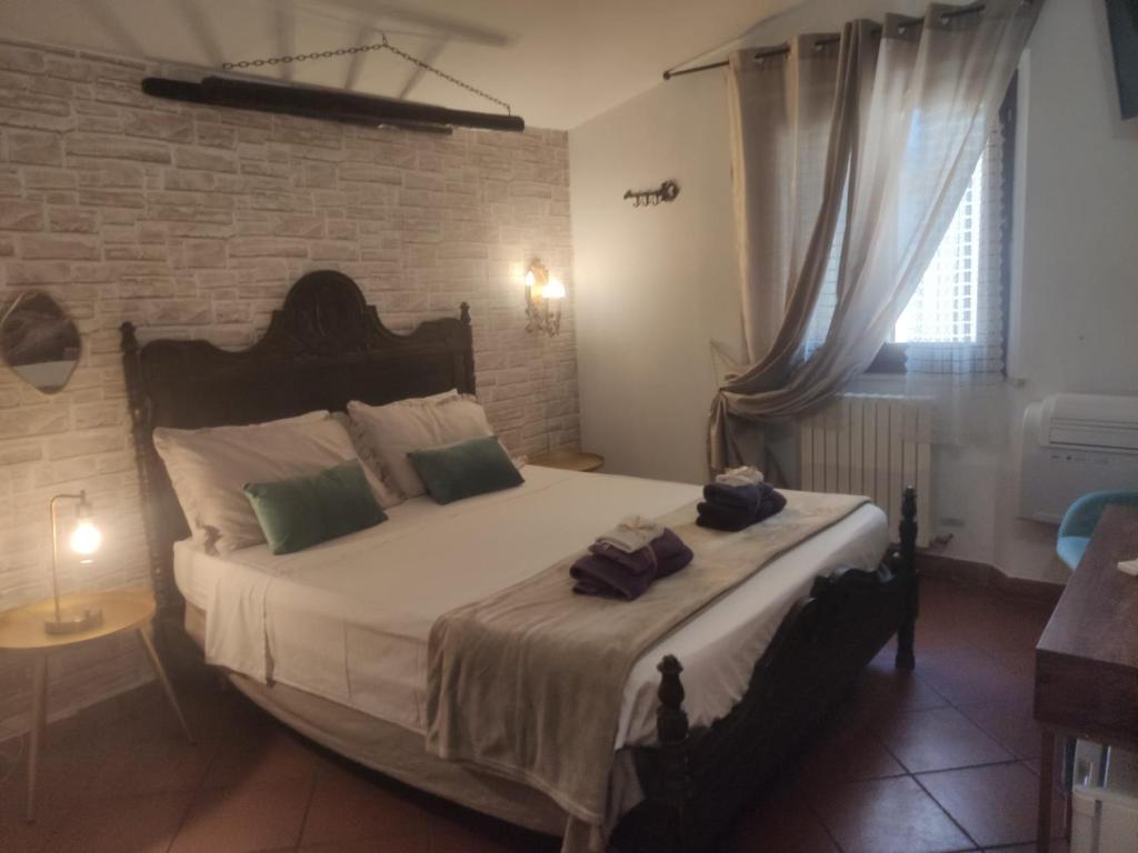 A bed or beds in a room at Stenghe Stracche