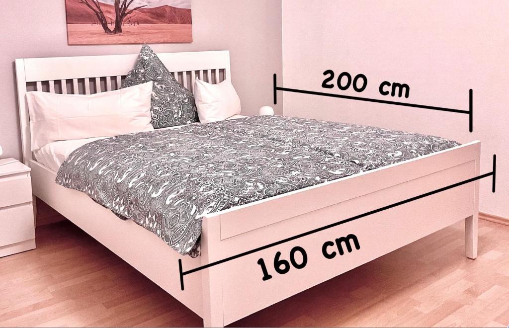 Postel nebo postele na pokoji v ubytování Gästehaus Backes