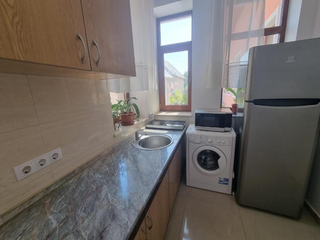 Kuchyň nebo kuchyňský kout v ubytování Casa Sali