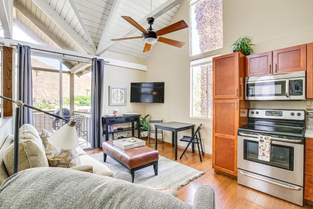a living room with a couch and a ceiling fan at Balcony and Views Pet-Friendly Indian Wells Unit in Indian Wells
