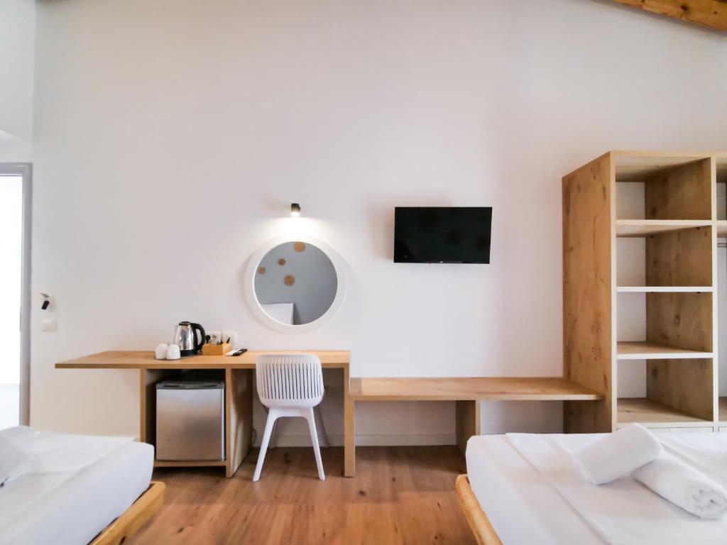 Postel nebo postele na pokoji v ubytování Orchard Retreat