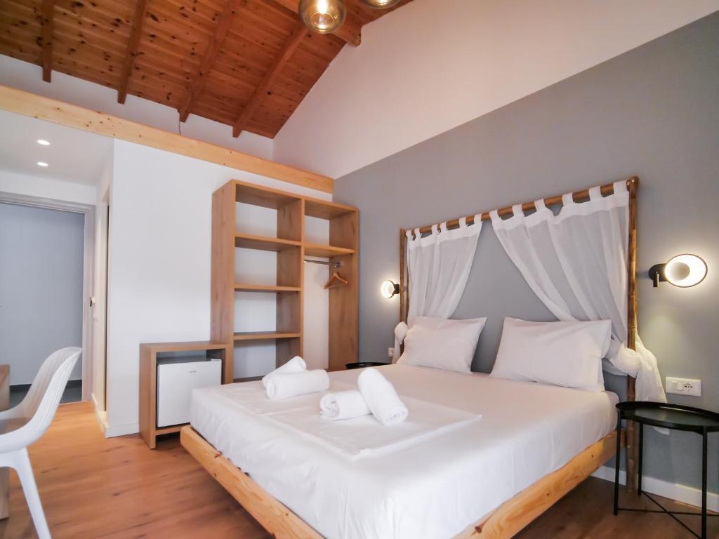 Postel nebo postele na pokoji v ubytování Orchard Retreat