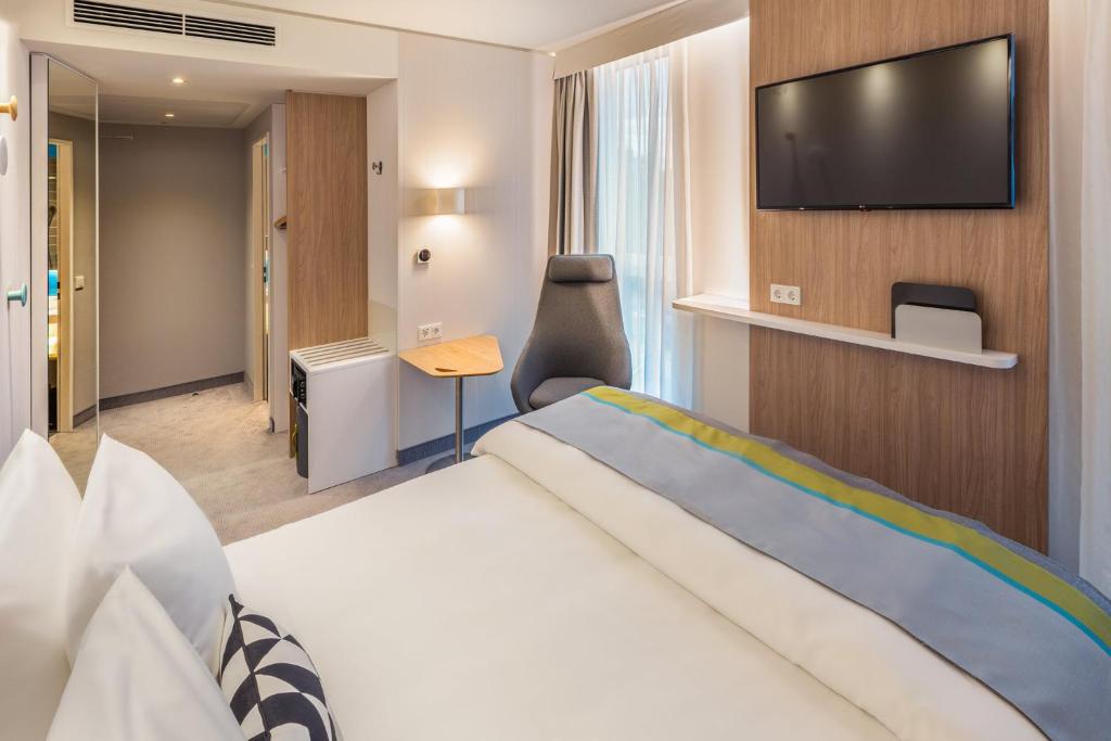 Postel nebo postele na pokoji v ubytování Holiday Inn Express - Erlangen by IHG