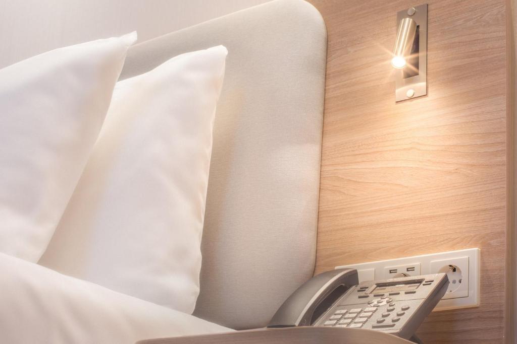 Postel nebo postele na pokoji v ubytování Holiday Inn Express - Erlangen by IHG