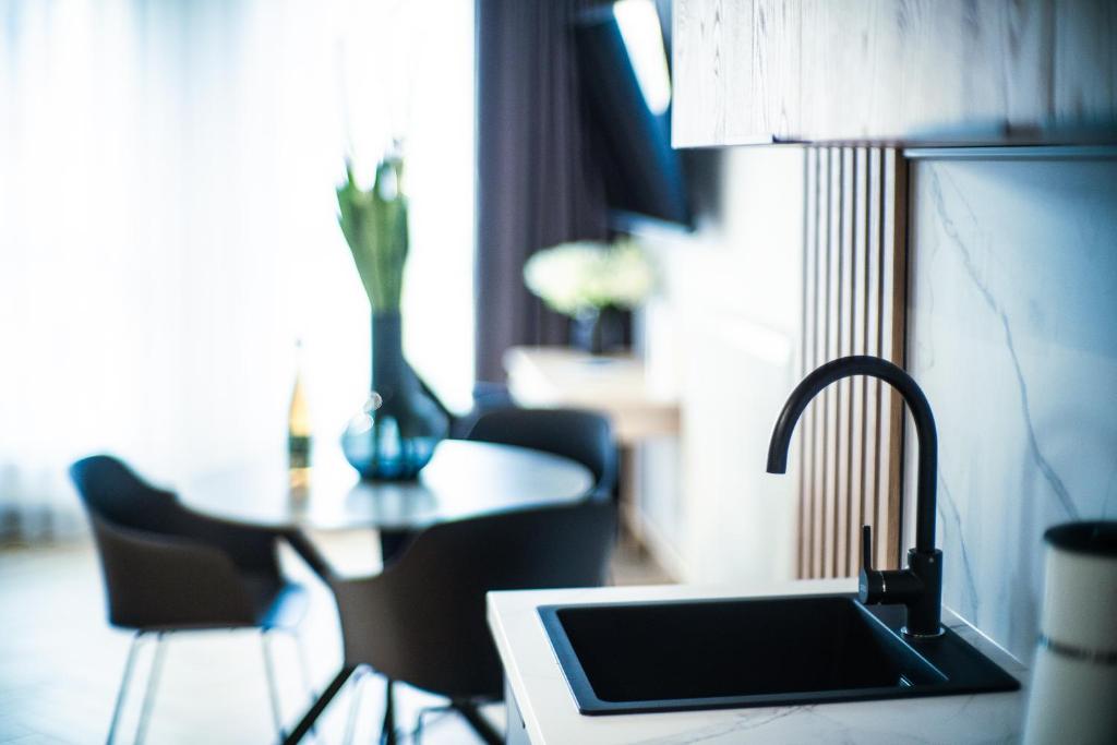 TV a/nebo společenská místnost v ubytování Apartamenty I SORAU