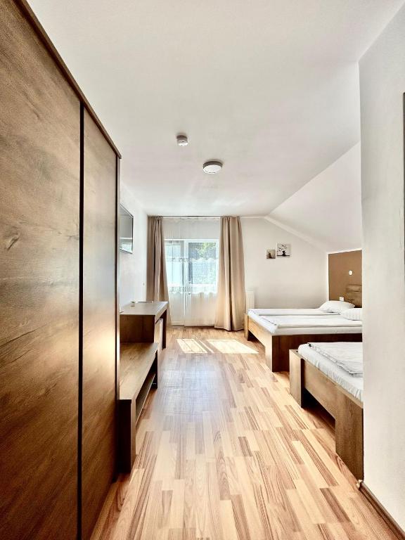 Postel nebo postele na pokoji v ubytování Casa Popa’s
