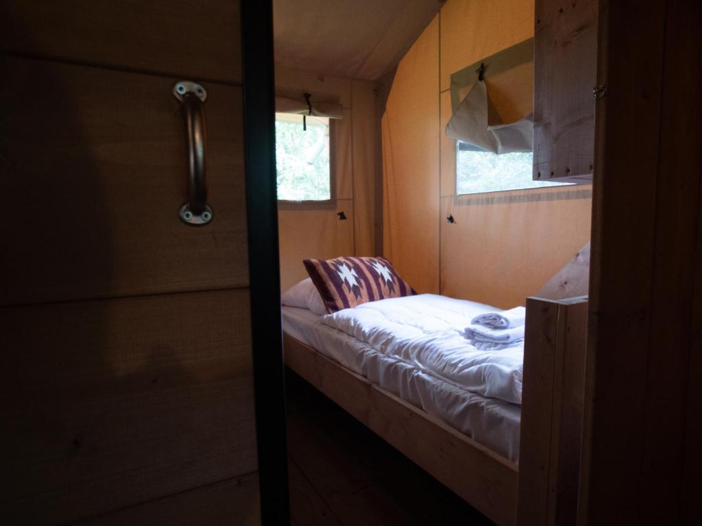 Postel nebo postele na pokoji v ubytování Ecolodges De Dreef